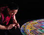 Sand Mandala Monk with chak-pur (sand funnel)