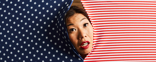 Kristina Wong's face coming through American flag