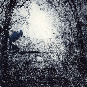 Image of an artwork in black and white with a bright white center and what looks like an arch of trees in black.