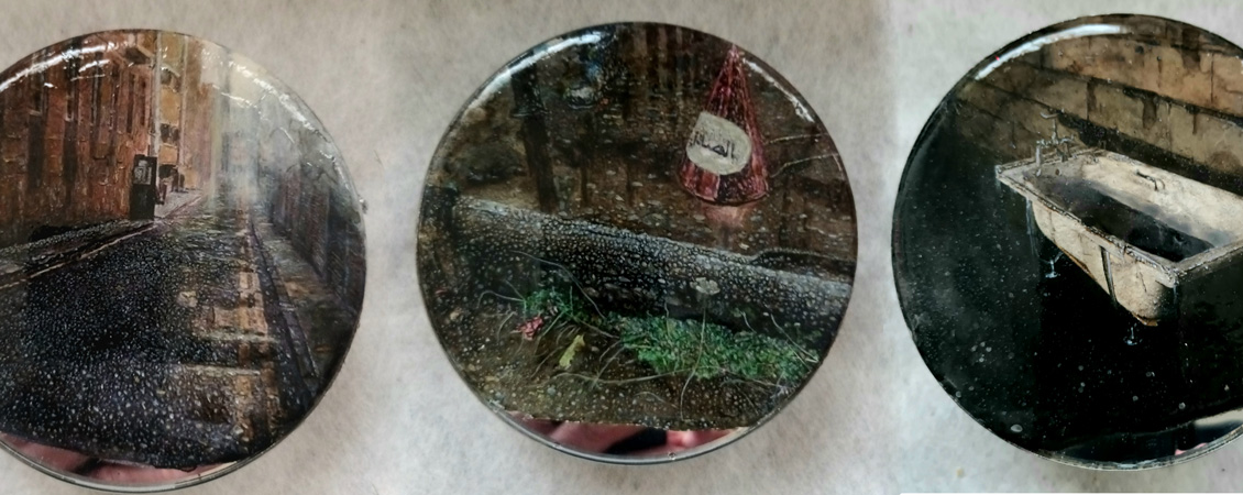 circular paintings of scenes on vintage car rearview mirrors