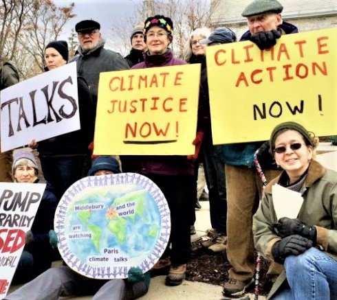 Third Act Vermont elder activists with signs