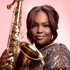 Camille Thurman headshot with saxophone in hand