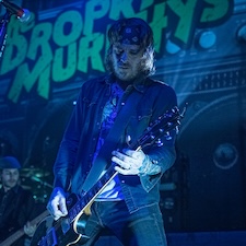 Dropkick Murphys guitarist on stage